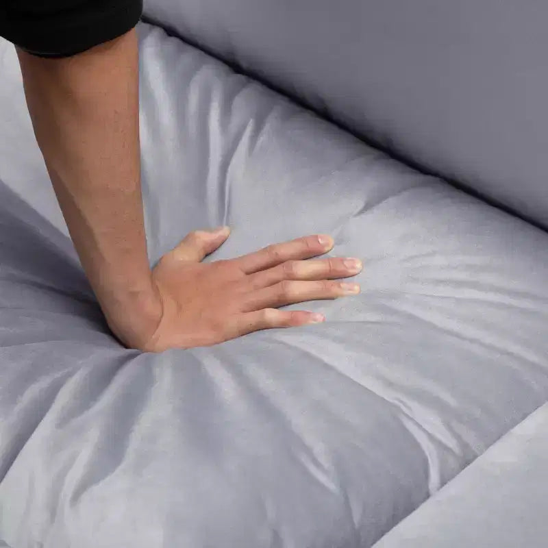 117.7 Divano componibile con pouf grigio scuro, in velluto.