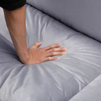 117.7 Divano componibile con pouf grigio scuro, in velluto.