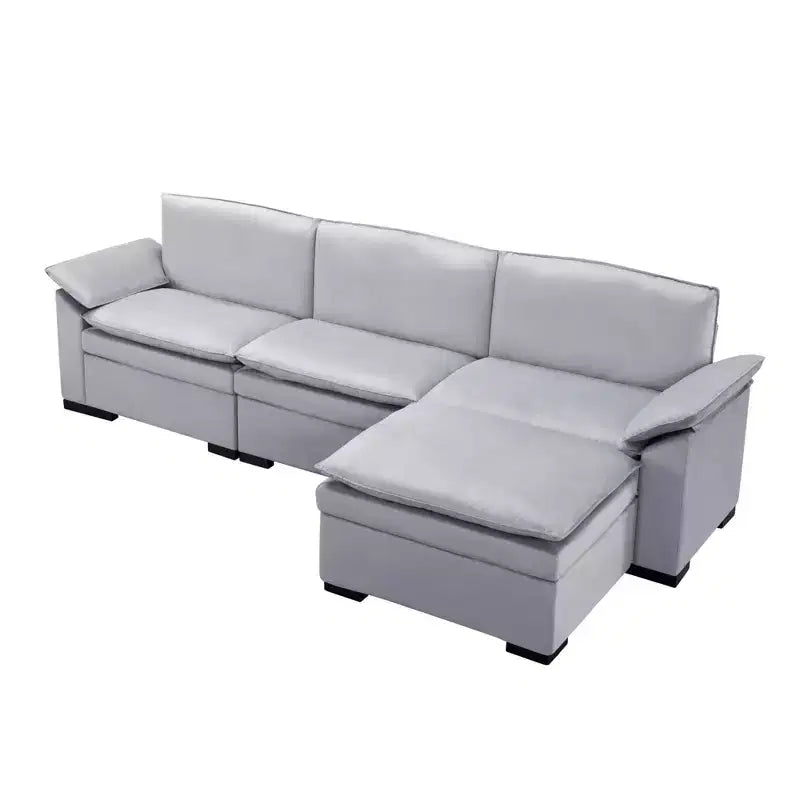 117.7 Divano componibile con pouf grigio scuro, in velluto.