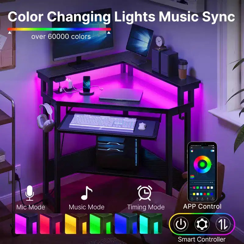 Piccola scrivania angolare per computer con presa di corrente, luce LED, supporto per monitor e vassoio per tastiera