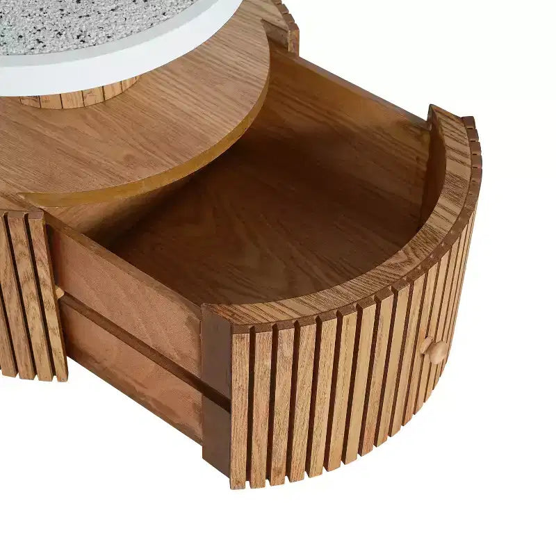 Tavolino accentato a forma di quadrifoglio, piano in resina effetto pietra, base in legno con cassetto portaoggetti